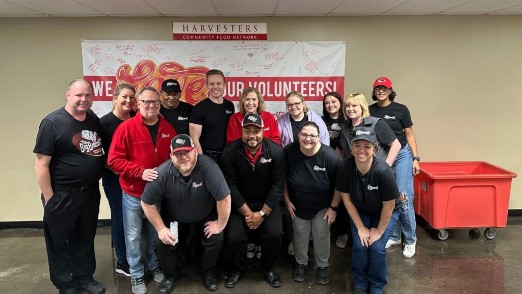 An image of a dozen team members from The Big Biscuit at Harvesters